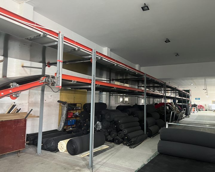 Neoprene and backing rolls stacked in the material store